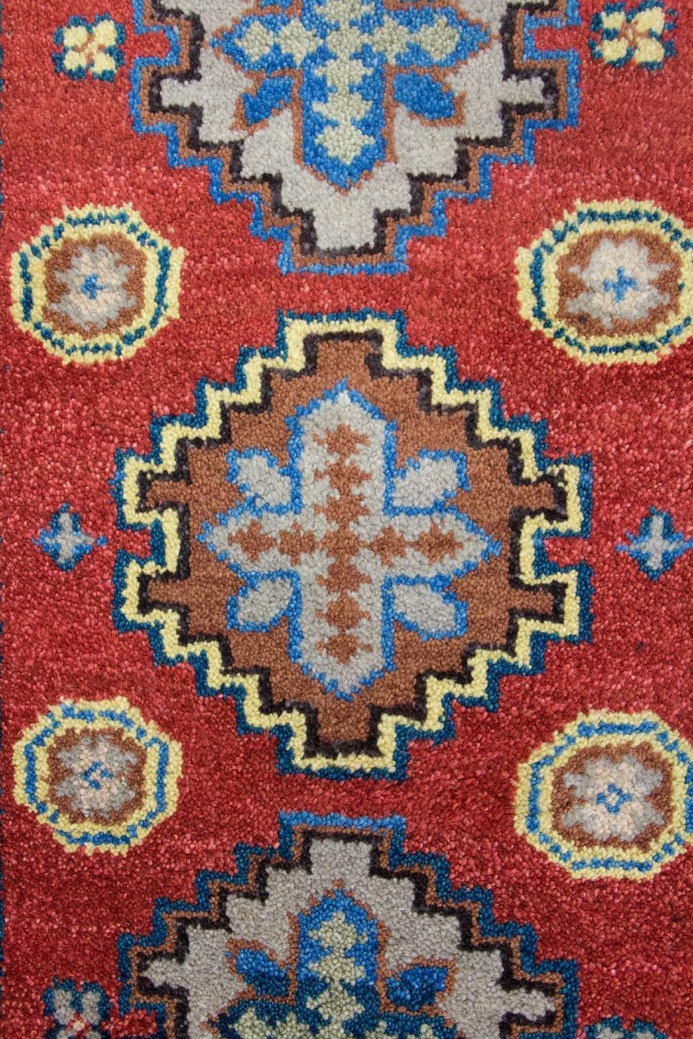 Orientalsk tæppe - 124 x 63 cm - rød